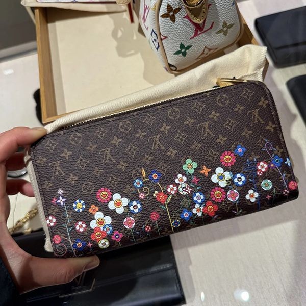 素敵な《日本限定》ルイヴィトン LV×TM ジッピー・ウォレット 偽物 M14162