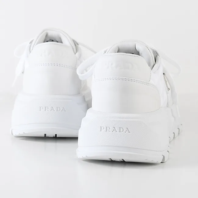 プラダ Prax 01 Re-Nylon xレザー 偽物 スニーカー 1E620N 3LNW