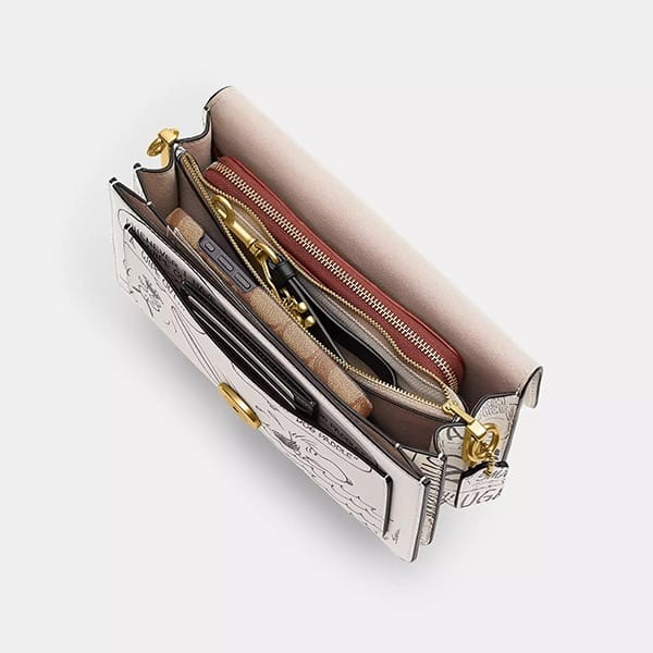 高品質スヌーピー限定コラボ【コーチ】タビーショルダーバッグ26 CCB04